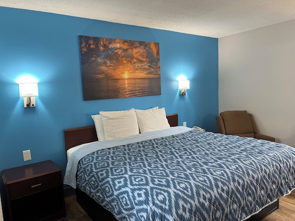 Deluxe kamer | Een bureau, gratis wifi, beddengoed