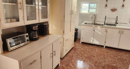 Spacious 4-bedroom house with WiFi and AC in peaceful Corozal Town