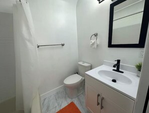 Hair dryer, towels, soap, toilet paper