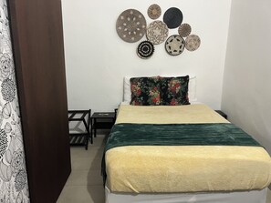 1 habitación, tabla de planchar con plancha, wifi y ropa de cama 