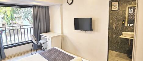 Deluxe Double Room, City View | Desk, laptop workspace, iron/ironing board, free WiFi