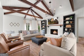 TV, fireplace, books