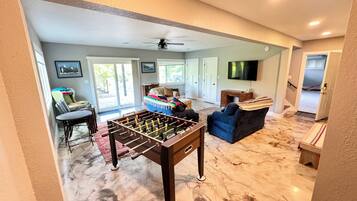 Smart TV, foosball, books