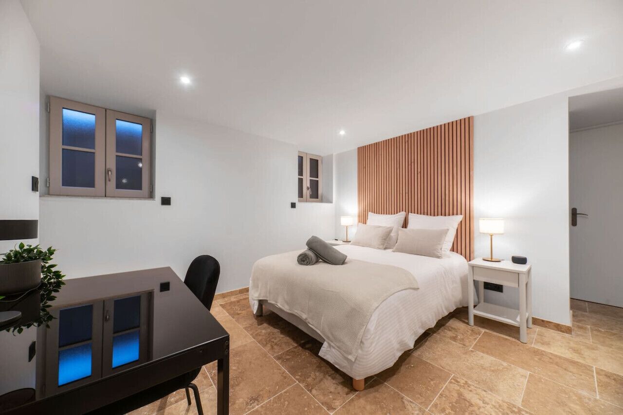 1 bedroom, desk, iron/ironing board, travel crib