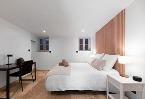 1 bedroom, desk, iron/ironing board, travel crib