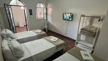 Business Quadruple Room | Bathroom | Shower, designer toiletries, hair dryer, towels
