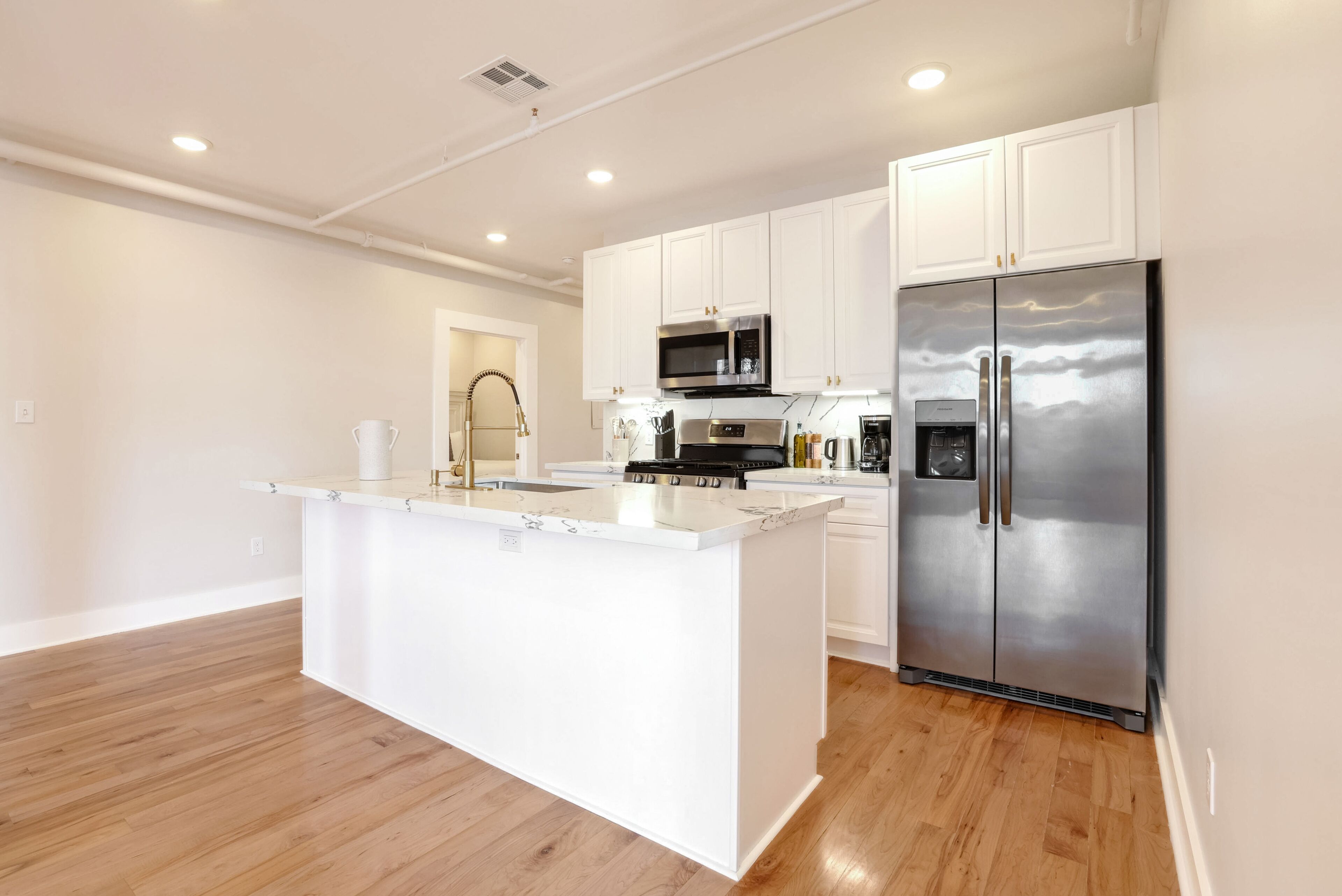 Standard Suite, 3 Bedrooms | Private kitchen | Fridge, microwave, oven, stovetop