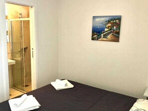 2 habitaciones, tabla de planchar con plancha y wifi gratis 