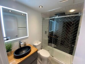 Hair dryer, towels, soap, toilet paper