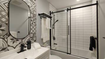 Hair dryer, towels, soap, toilet paper