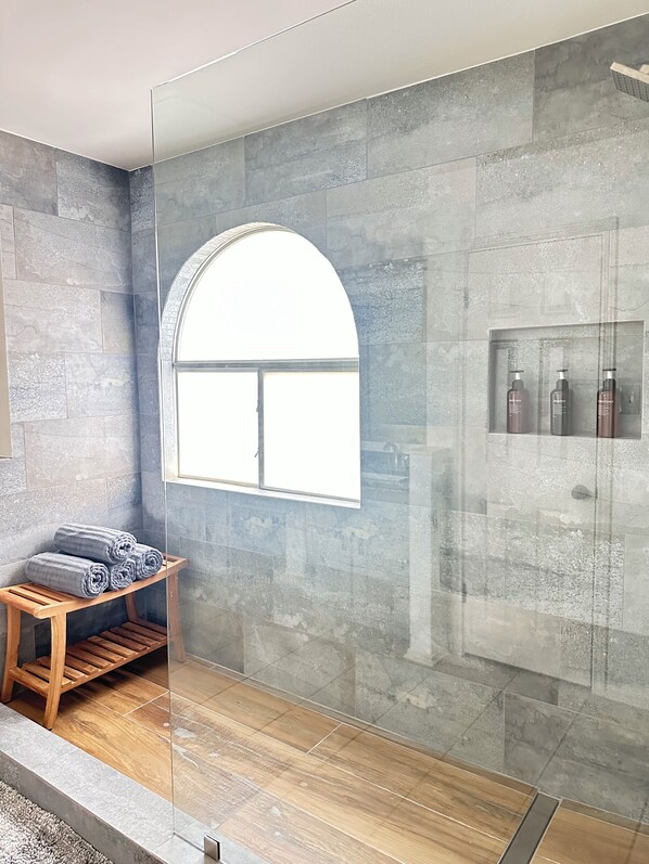 Shower, hair dryer, towels, soap