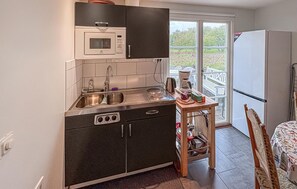 Fridge, microwave, oven, stovetop - 1 bedroom cozy apartment in Brantevik (Brantevik)