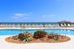 Outdoor pool, a heated pool - SUNGLOW RESORT 503 Spacious Deluxe Ocean Front Corner Suite with Large Balcony (Daytona Beach Shores)
