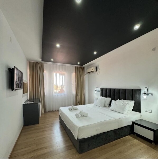 Premium bedding, memory-foam beds, in-room safe, desk