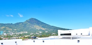 Enjoy breathtaking views of the surrounding mountains from this rooftop terrace.