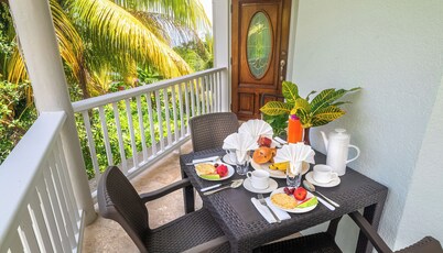 Ferapalms Tropical Escape with Scenic Ocean and Mountain Views