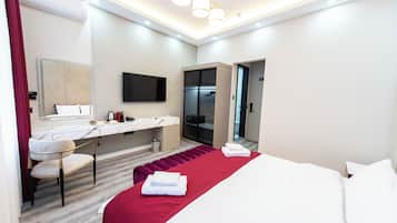 Habitación doble Deluxe, 1 cama King size, para no fumadores | 1 habitación, ropa de cama de alta calidad y camas Select Comfort