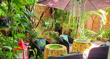 Garden-View Double Room A/C, Private Bath & Terrace Access