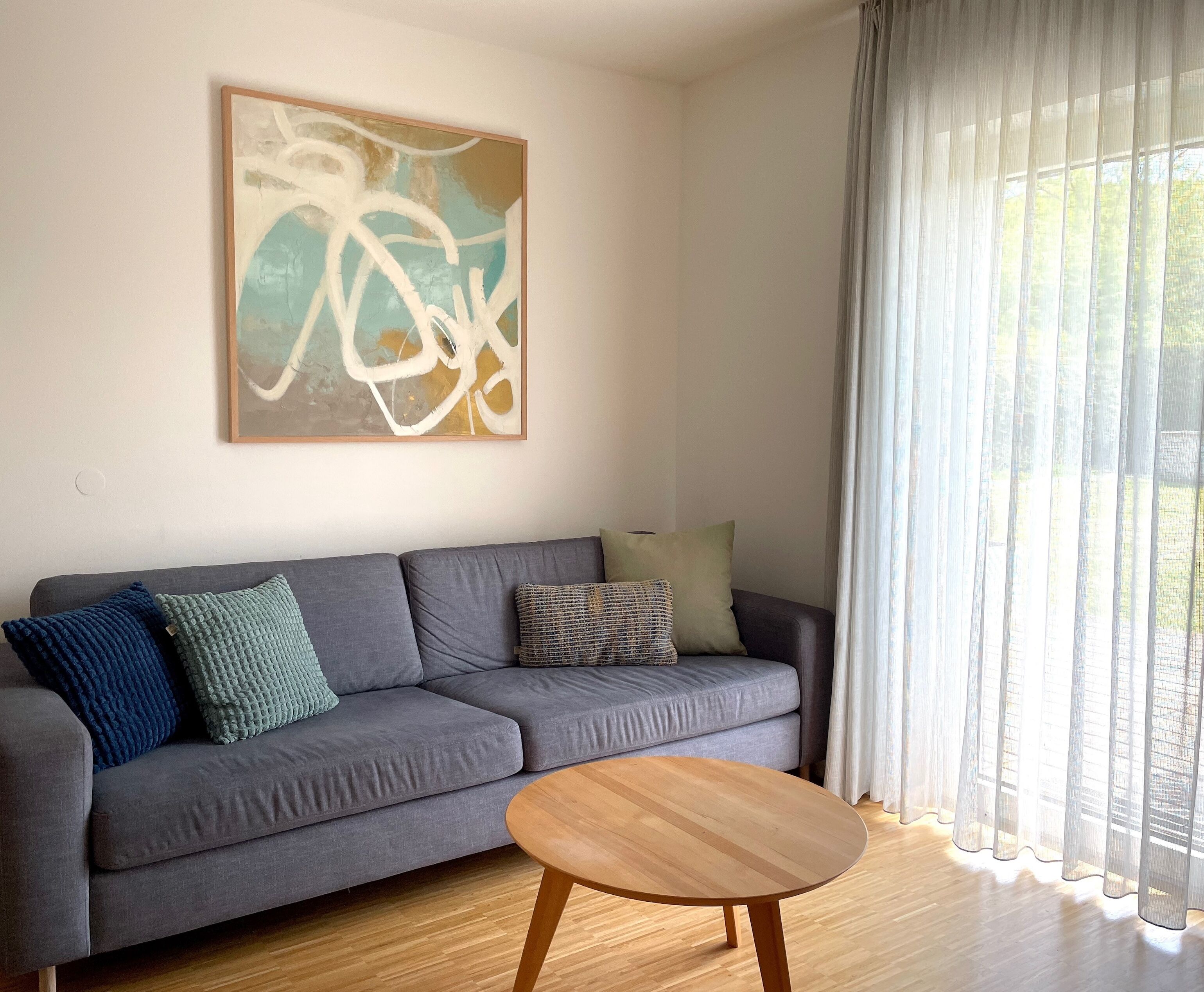 Deluxe Apartment 17 - mit 2 Schlafzimmer, Wohnküche, Terrasse und Garten-Ferienwohnung 17 - Couch, TerrassenzugangFerienwohnung 17 -