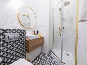 Shower, free toiletries, hair dryer, towels
