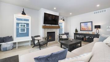 Smart TV, fireplace, books