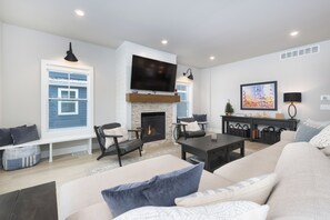 Smart TV, fireplace, books