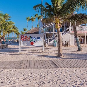 A beachside sign for Bibijagua, a shop, eatery, and drink establishment. - Cozy 2-bedroom apartment in Punta Cana in a safe, Gated community with AC, WiFi. (Punta Cana)