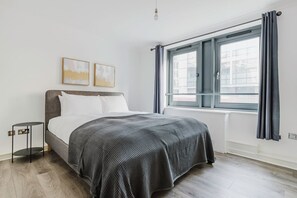 2 slaapkamers, een strijkplank/strijkijzer, wifi, beddengoed
