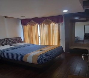 ห้องแฟมิลี่สวีท | เครื่องนอนระดับพรีเมียม, ห้องเก็บเสียง, Wi-Fi ฟรี, ผ้าปูที่นอน