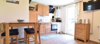 Maison de vacances avec cheminée et terrasse