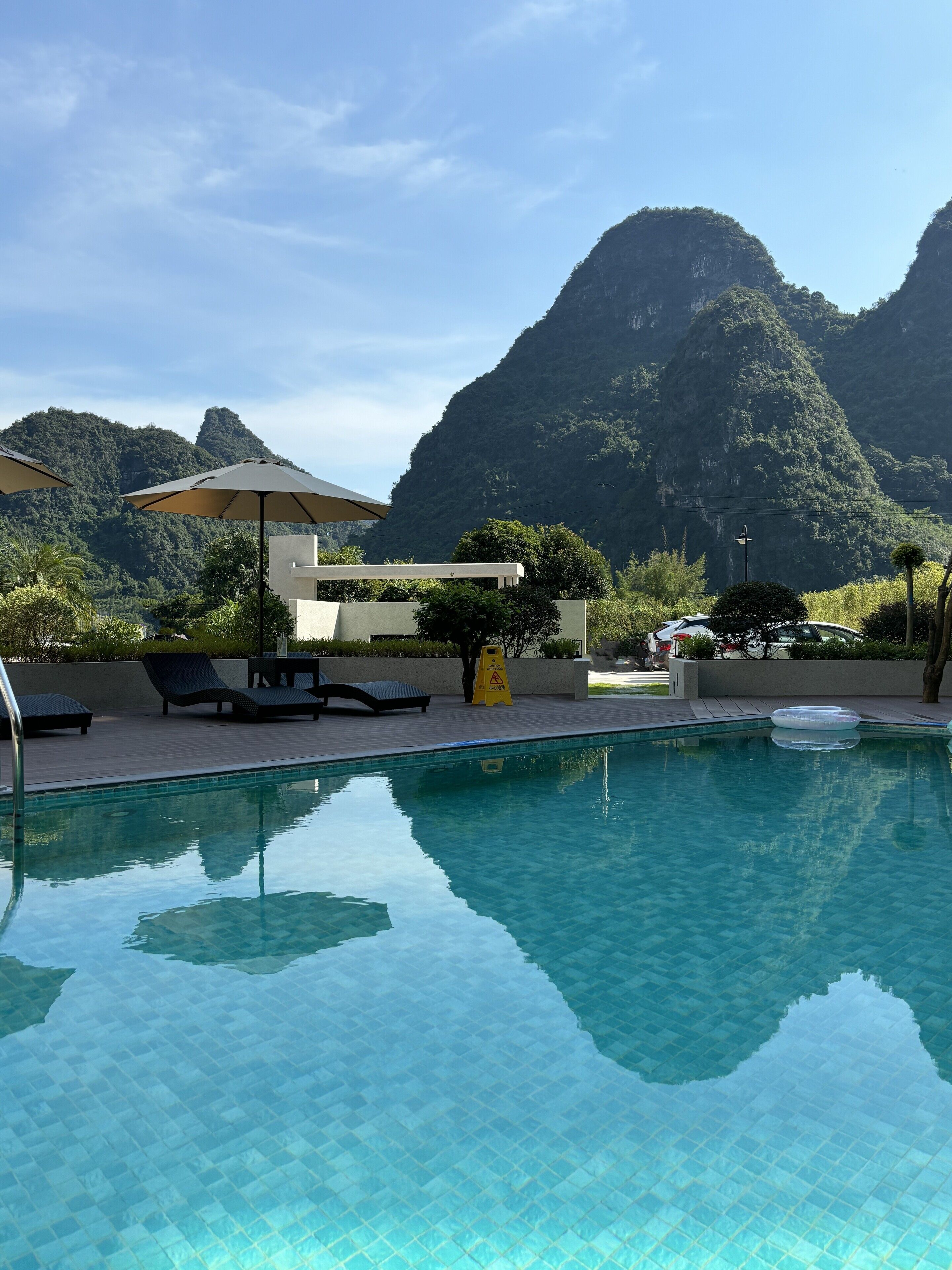 Outdoor pool, pool umbrellas, sun loungers