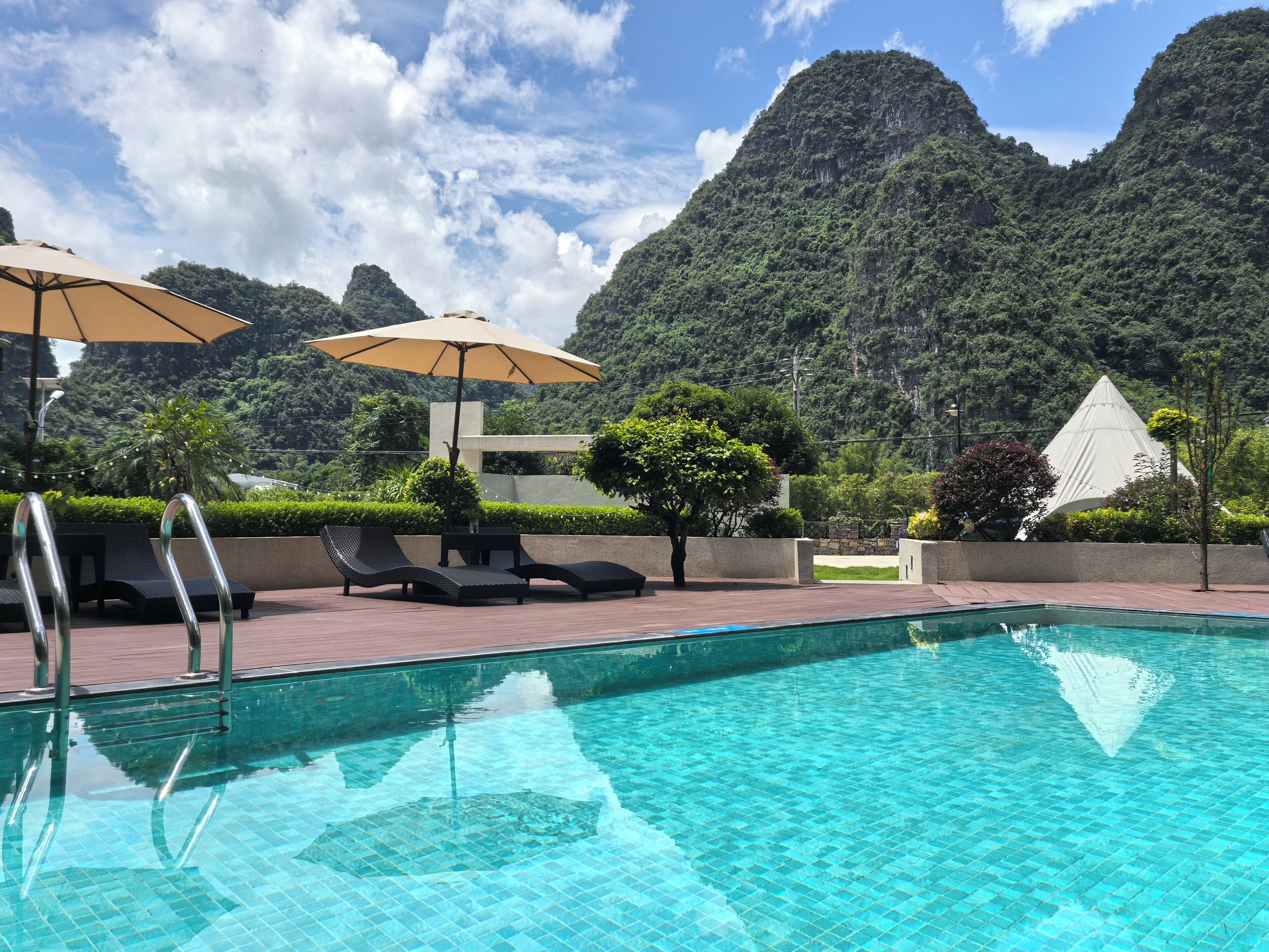 Outdoor pool, pool umbrellas, pool loungers