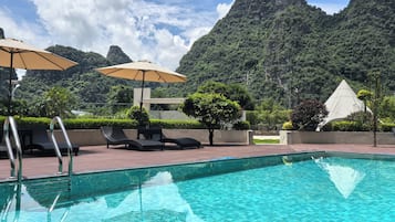 Outdoor pool, pool umbrellas, pool loungers