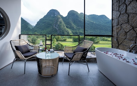 ファミリー ダブルまたはツインルーム バルコニー リバービュー | バルコニーからの眺望. Yangshuo-Greenery Retreat