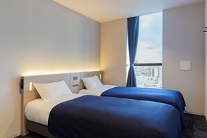 Habitación estándar | Cortinas blackout, wifi gratis y ropa de cama