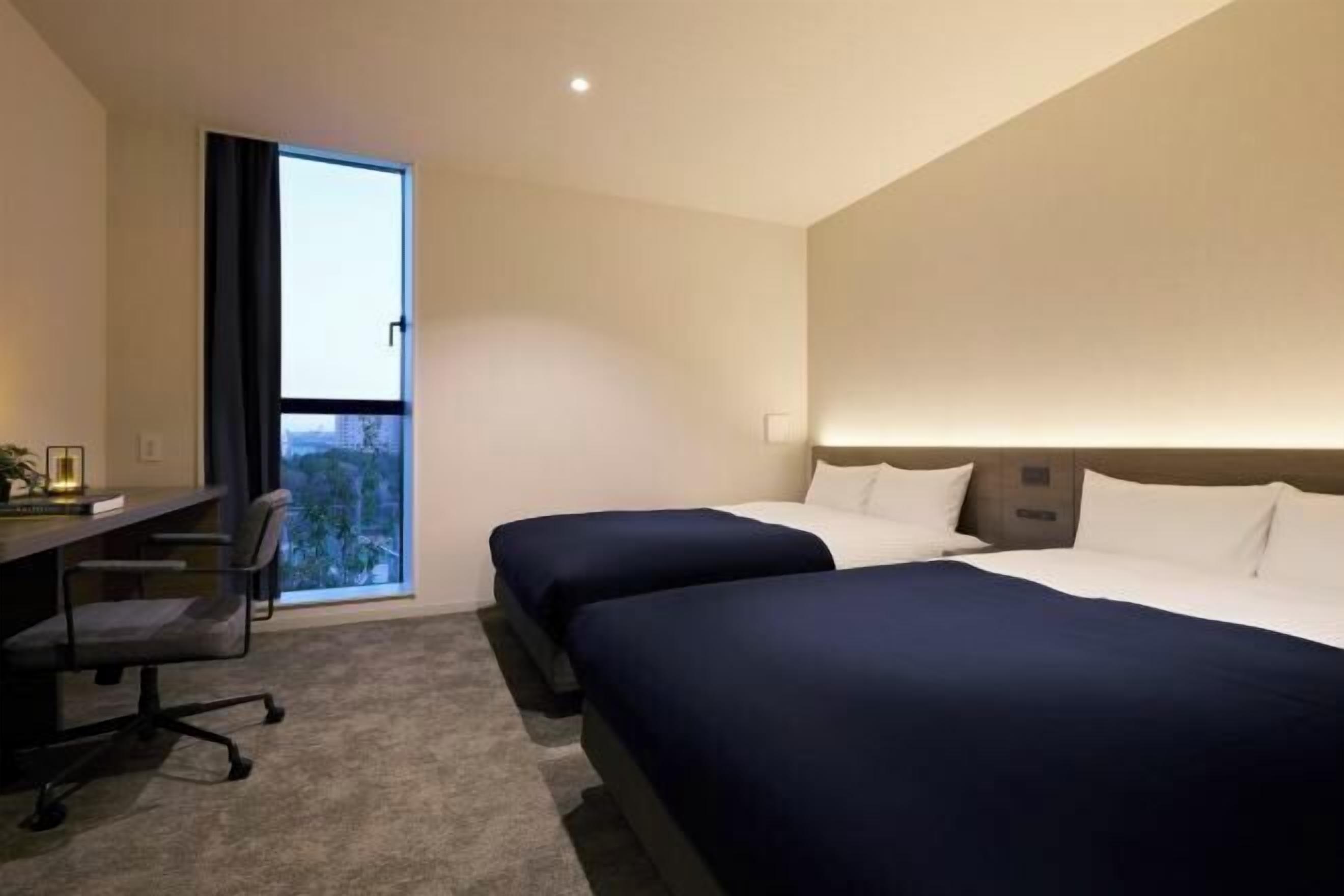 Blackout drapes, free WiFi, bed sheets