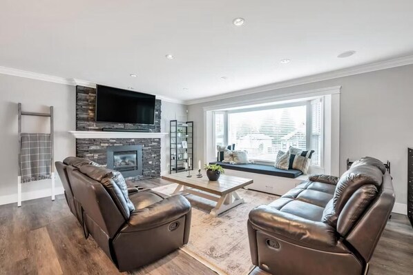 Smart TV, fireplace, books