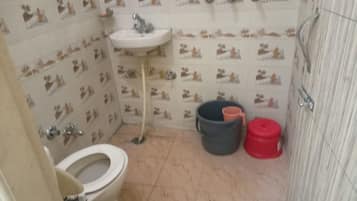 Shower, rainfall showerhead, towels, soap