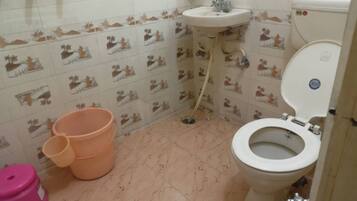 Shower, rainfall showerhead, towels, soap