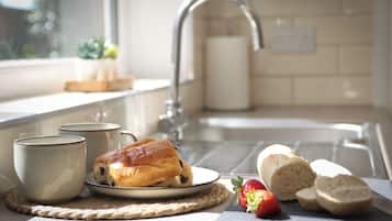 Fridge, microwave, oven, dining tables