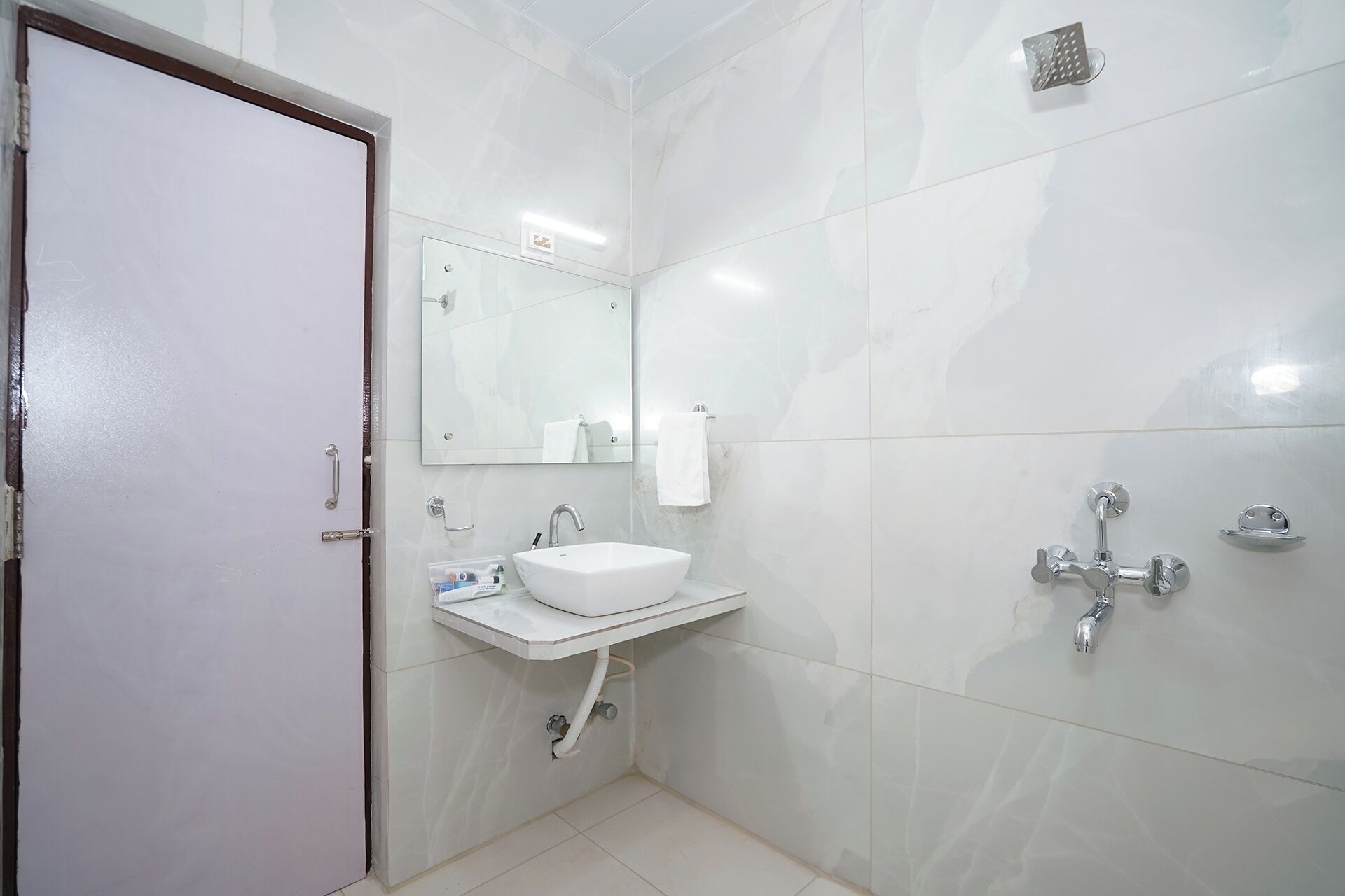 Shower, free toiletries, towels, soap