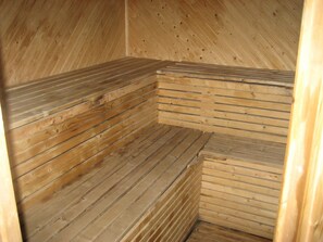 A sauna with wooden benches and a sloped ceiling. - Perfect House for Groups, Many Facilities, 14 Miles From Skiarea Branas (Sysslebäck)