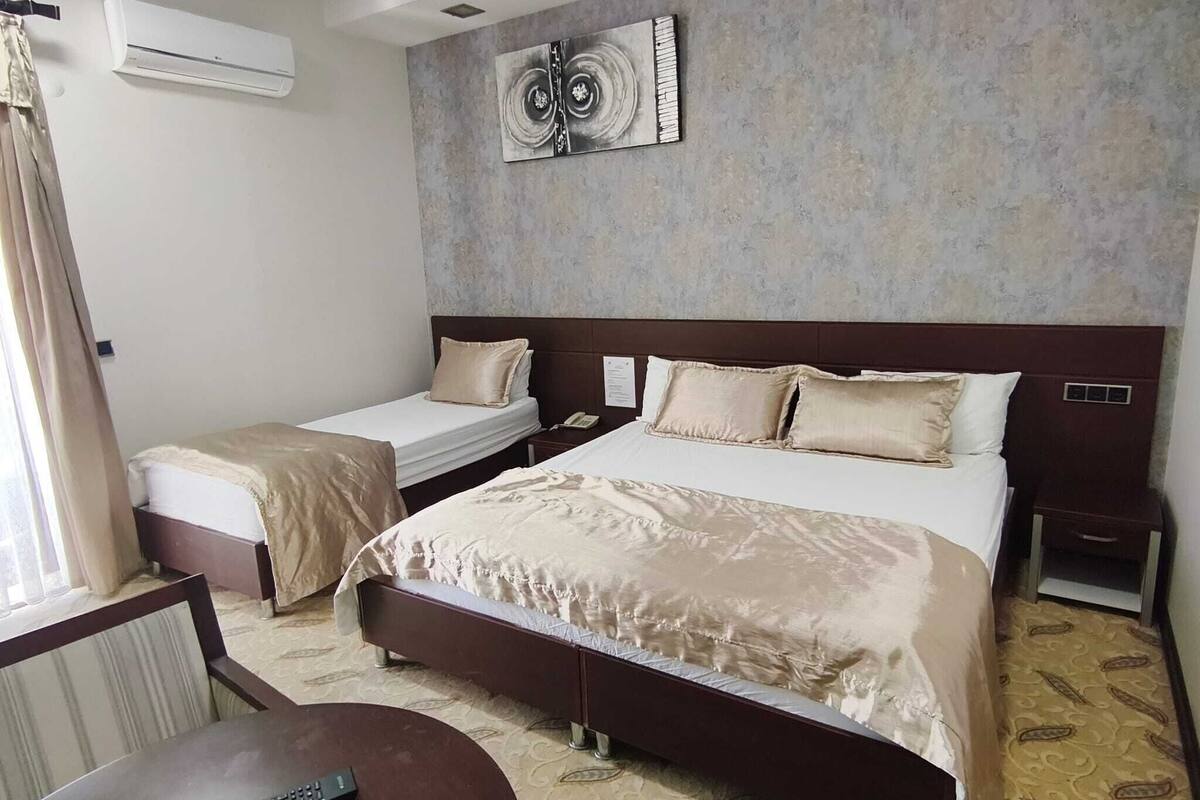 Chambre Triple Standard, vue ville | 1 chambre, Wi-Fi gratuit