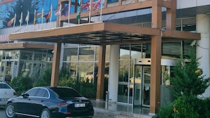 A hotel with a modern facade, featuring a prominent logo and the name 'KOC HOTEL' displayed on the building. - Koç Otel Çankırı (Cankiri)
