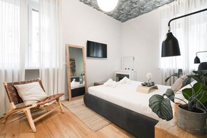 1 slaapkamer, een strijkplank/strijkijzer, wifi, beddengoed