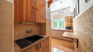 Appartamento (9) | Cucina privata | Frigorifero, piano cottura, bollitore elettrico
