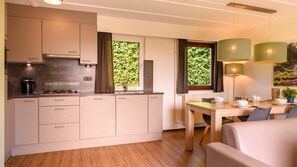 Fridge, stovetop, coffee/tea maker, electric kettle