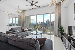 Deluxe Apartment, 3 Bedrooms, Balcony, City View | Laptop workspace, iron/ironing board, free WiFi, bed sheets - NaiBnB @ Regalia Residence (Kuala Lumpur)