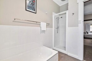 Shower, hair dryer, towels, shampoo