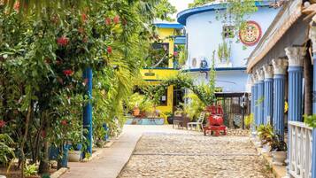 Habitación, 2 camas matrimoniales, para no fumadores, vista al jardín | Vista al jardín